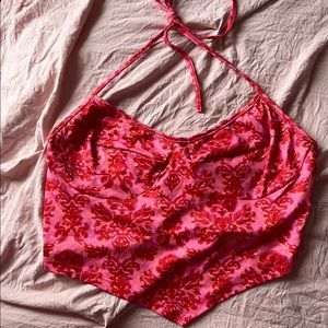 pink crop top with asymmetrical hem